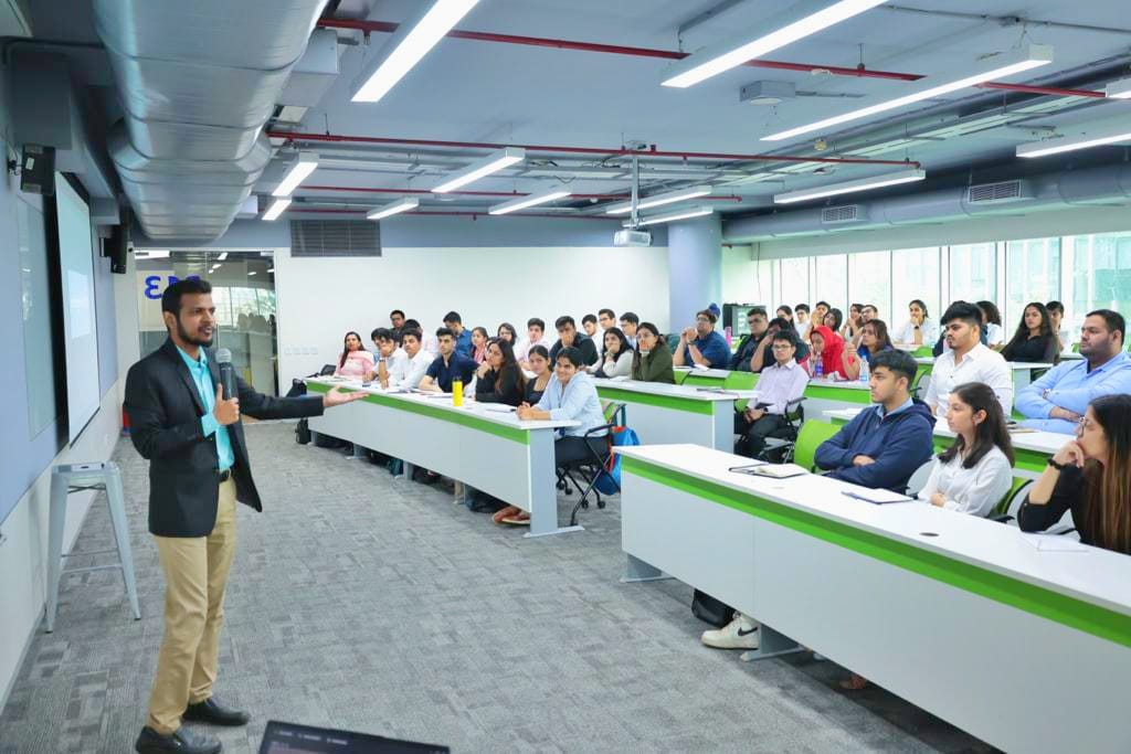 Ramanand Bhatt training a classroom of students